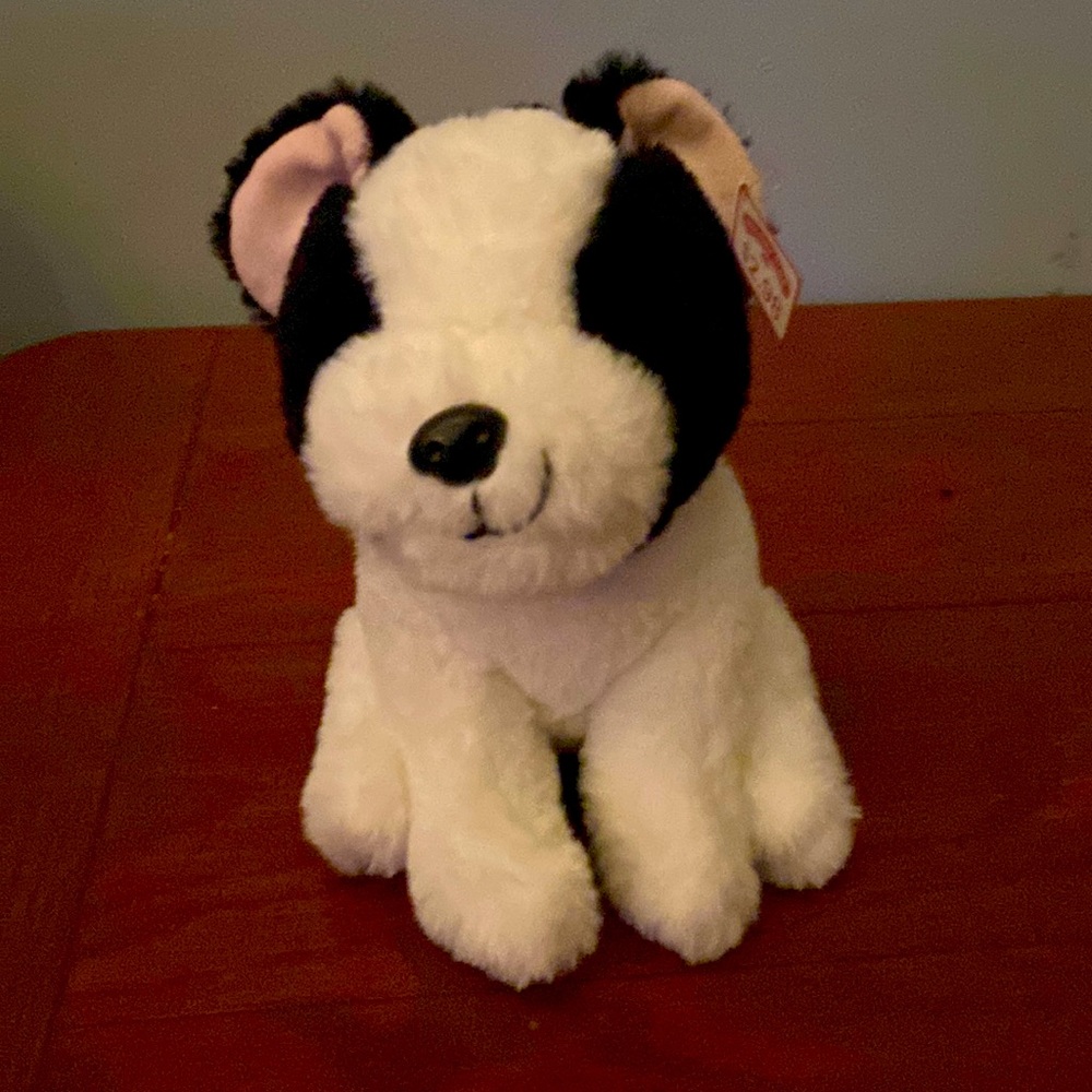 This is a  soft black and white stuff animal